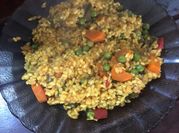 Una foto de risotto curcuma