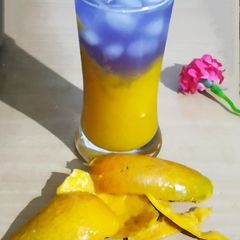 A picture of Mango Butterfly Pea Shake.