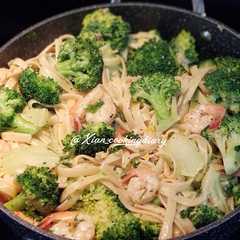 A picture of Shrimp Scampi with Creamy Garlic Fettucine & Broccoli.