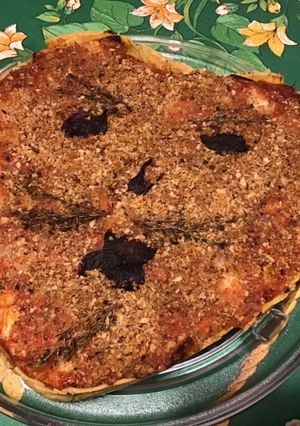 Une photo de Tarte bonhomme » au céleri branche,tomates, mozzarella,oignon de roscoff et poivre vert frais
