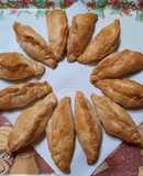 Empanaditas de copetin con mejillones a la provenzal