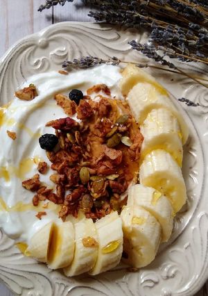 A picture of American Breakfast: Banana Granola Yogurt.