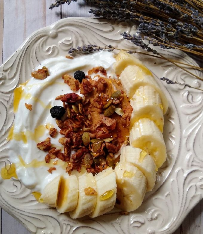 A picture of American Breakfast: Banana Granola Yogurt.