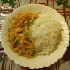 A picture of Steamed rice with fried vegetables.