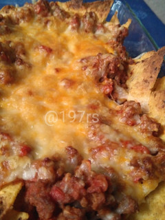 Una foto de Nachos con carne y queso