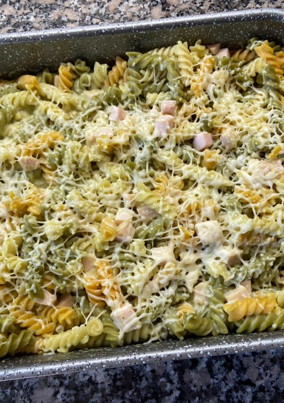 Una foto de Hélices con salsa de calabacín