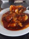 Tuco rápido de chorizo con polenta cremosa