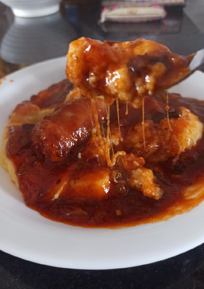 Una foto de Tuco rápido de chorizo con polenta cremosa