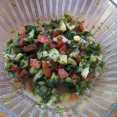 A picture of Summer cucumber and tomato "rainbow" salad.