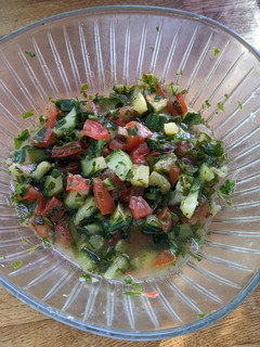 A picture of Summer cucumber and tomato "rainbow" salad.