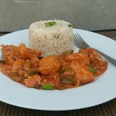 A picture of Chicken manchurian with garlic ginger rice🍚🐔.