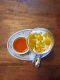 Mango mousse with fresh mango and passionfruit sauce