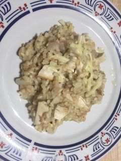 Una foto de Arroz integral con pollo y mozzarella