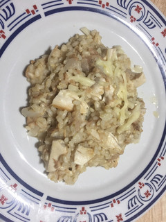 Una foto de Arroz integral con pollo y mozzarella