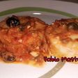 Medaglione di merluzzo con pomodorini, olive nere e capperi