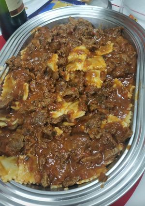 Una foto de Ravioles con salsa roja