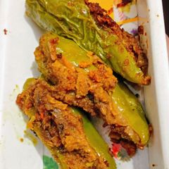 A picture of Dana Methi stuffed Mirchi.