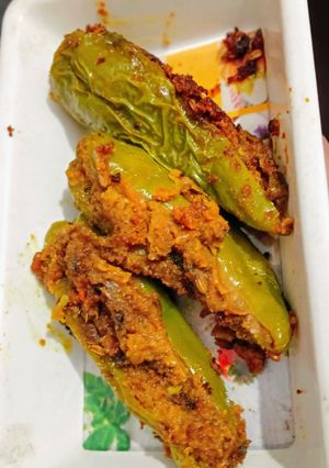 A picture of Dana Methi stuffed Mirchi.