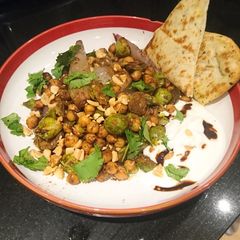 A picture of Tamarind sprouts with shallots, peanuts and chickpeas.