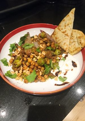 A picture of Tamarind sprouts with shallots, peanuts and chickpeas.