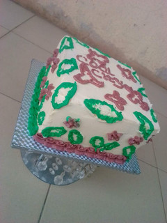 A picture of Vanilla & chocolate marble Christmas themed cake.
