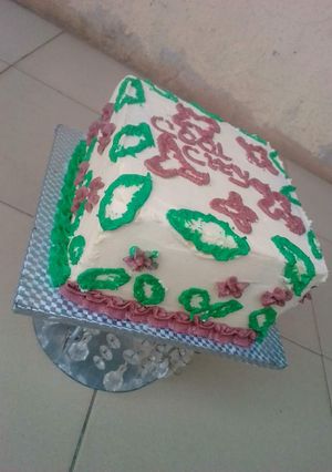 A picture of Vanilla & chocolate marble Christmas themed cake.
