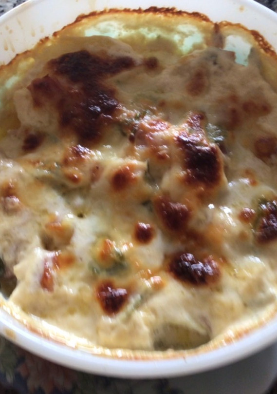 Una foto de Papas (patatas) al horno con queso
