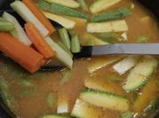 A picture of french beans and carrots