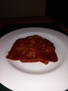 Una foto de Lasaña rellena con salsa de tomates de carne molida