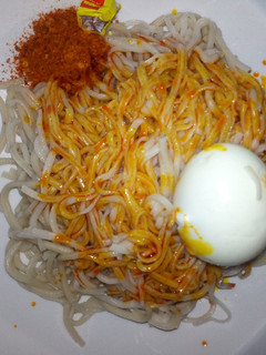 A picture of Taliyar Hausa with palm oil,pepper and boiled egg#kaduna state.