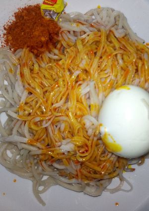 A picture of Taliyar Hausa with palm oil,pepper and boiled egg#kaduna state.