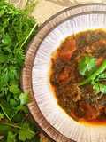 Shaljum with leaves in beef masala