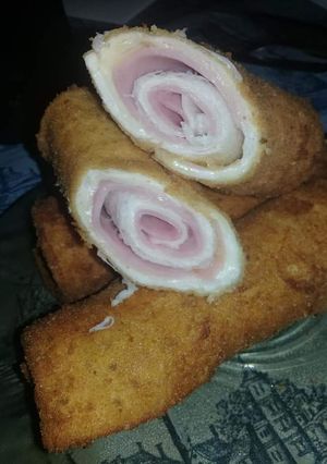 Una foto de Rollitos de jamón y queso