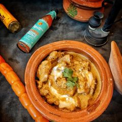 A picture of Butter chicken Handi.