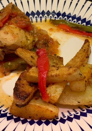 Una foto de Muslos de pollo a la portuguesa