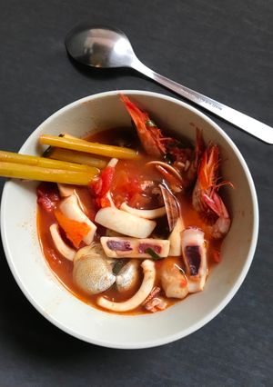 A picture of Thai Lemongrass Tomato Seafood Hot and Sour Soup.