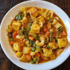 A picture of Tofu Korma with Mixed Vegetables.