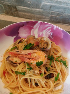 Foto di Spaghetti vongole e gamberi