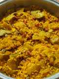 Arroz integral en cazuela, con alcachofas, jamón y bacon