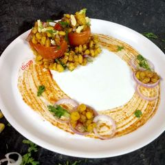 Baked tomato corn chatpata A picture of Baked tomato corn chatpata.
