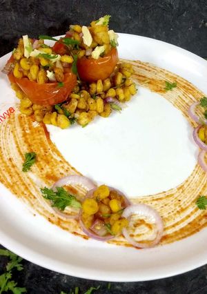A picture of Baked tomato corn chatpata.
