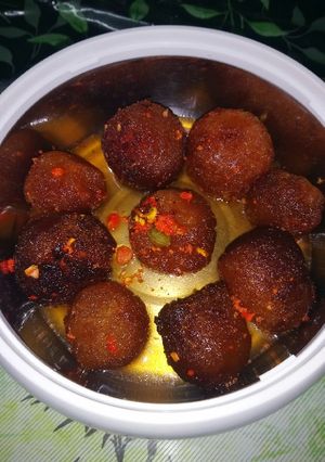 A picture of Gulab jamun(stuffed).