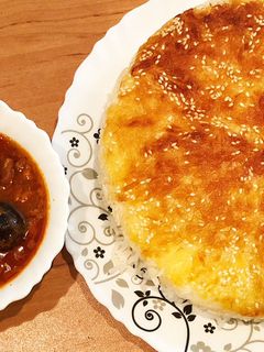 عکسی از دستور خورش قیمه با ته دیگ سیب زمینی رنده‌ای!