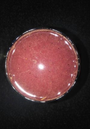 A picture of Orange and pomegranate juice.