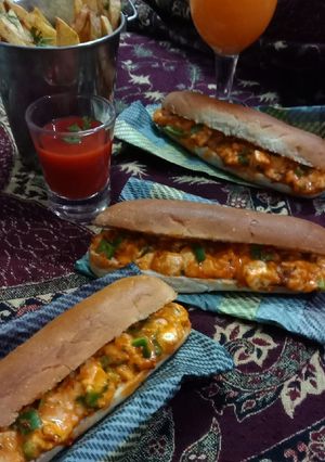 A picture of Cheesy paneer tikka hot dog.