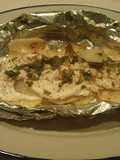 Pescado empapelado con papas
