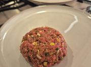 A picture of capers and steak