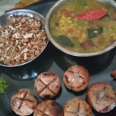 A picture of Rajasthani Famous Dish Tasty Dal Bati Churma.