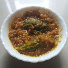 A picture of Parwal Masala / Pointed Gourd thick gravy / Potol Masala.