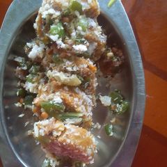 A picture of Chow chow muthia with bell pepper.